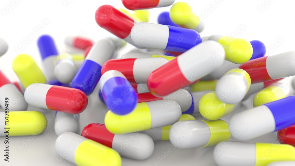 Falling colorful drug capsules or pills, shallow focus. 3D rendering