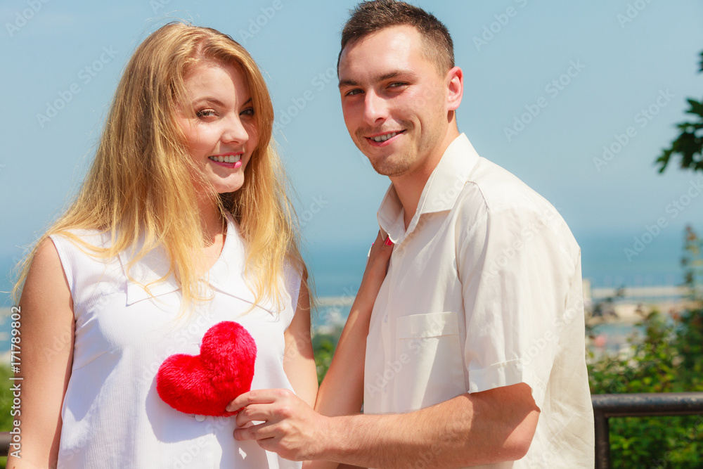 Happy romantic couple with holding heart Happy romantic couple with holding heart