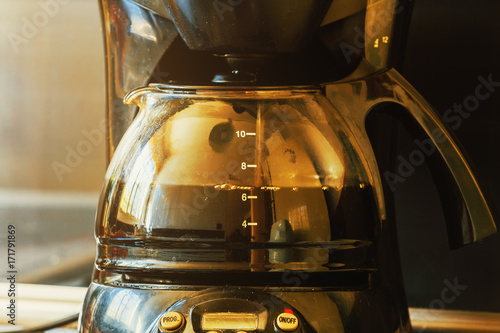 Vászonkép Close-up of electric glass coffee pot with measurer