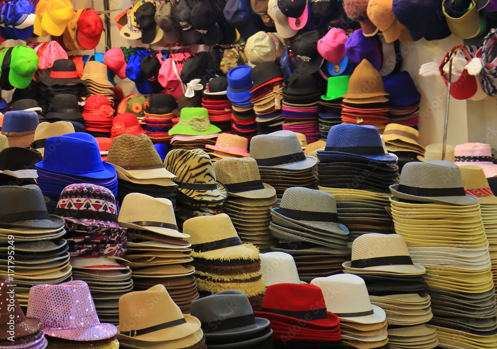 Uncountable colorful hats and many of hat stacks in the hat shop 