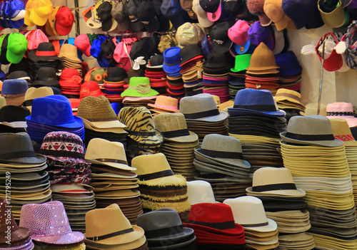 Uncountable colorful hats and many of hat stacks in the hat shop 