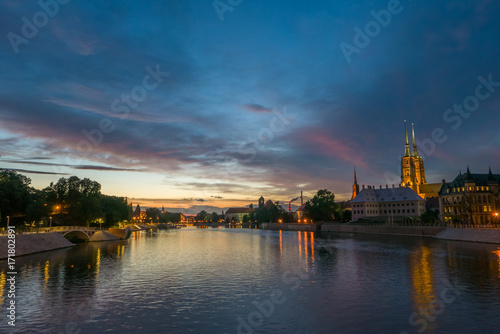 Majestic vivid sky over the river and old town in Wrocław, Poland