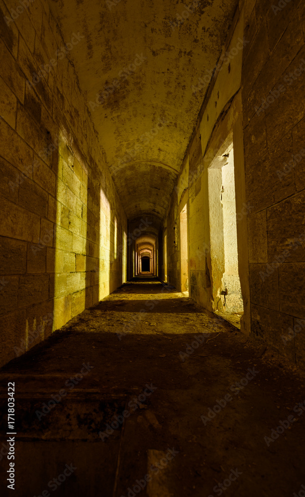 Long scary corridor in an abandoned military fort near the coast in croatia