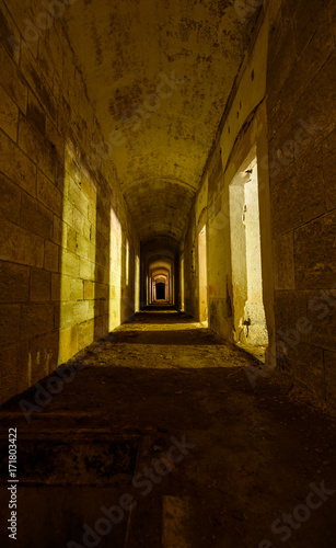 Long scary corridor in an abandoned military fort near the coast in croatia