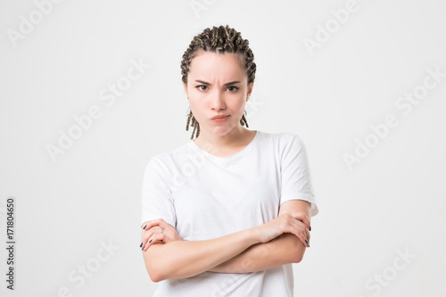 Caucasian young very unhappy woman, trying to argue or to complain
