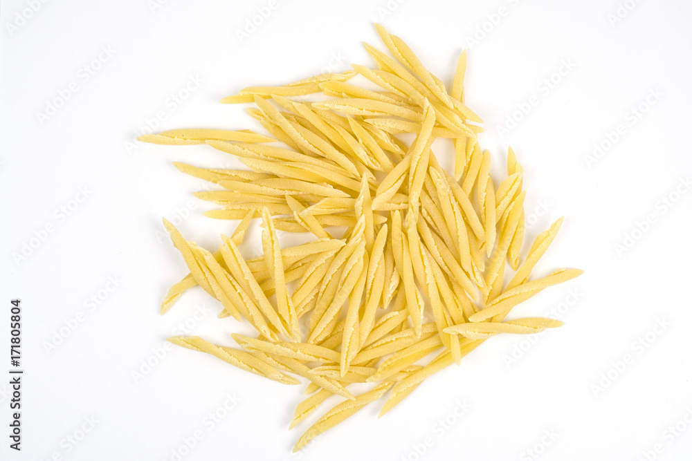 Dry pasta on white background, trofie. Dry pasta on white background, trofie.