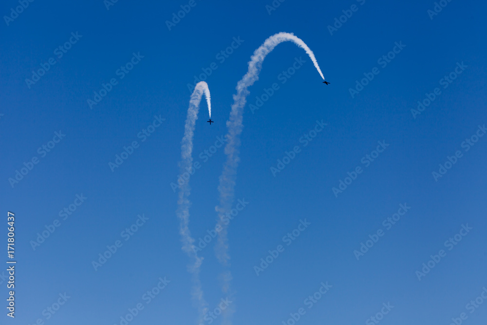 Jet planes flying against a clear, blue, summer sky. Reach for the sky! Jet planes flying against a clear, blue, summer sky. Reach for the sky!