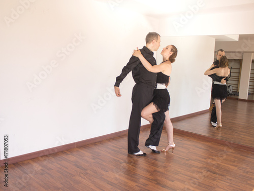 Couple of dancers dancing latin dances © gemaibarra