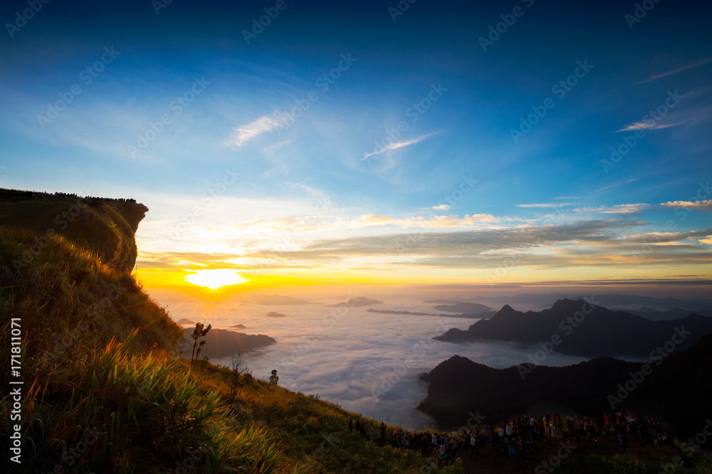 Tourist looking sunrise at Phu Chi Fa in Chiang rai, Thailand