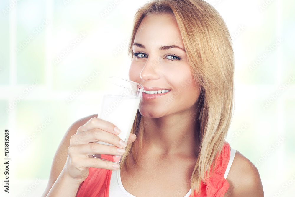 Beautiful woman drinking milk Beautiful woman drinking milk