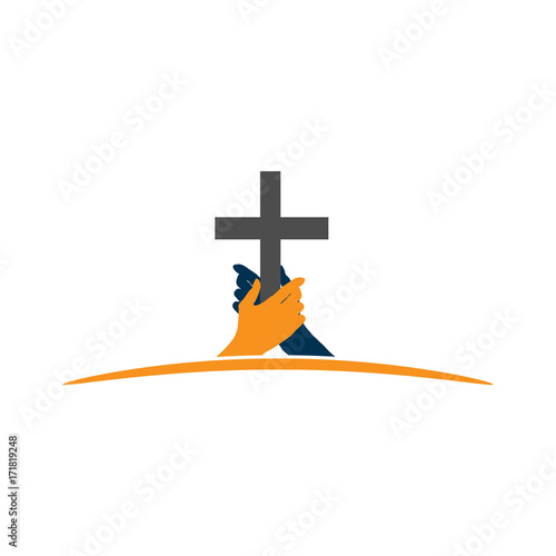 hand holding the cross. the concept of holding firm beliefs
