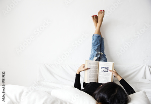 Asian woman reading lifestyle at home photo