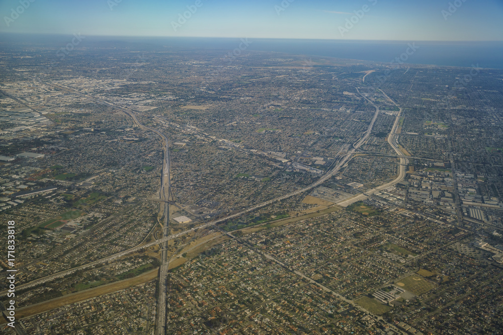 Aerial view of Santa Fe Springs, Norwalkm Bellflower, Downey, view from window seat in an airplane