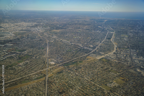 Obraz na płótnie Aerial view of Santa Fe Springs, Norwalkm Bellflower, Downey, view from window seat in an airplane w salonie