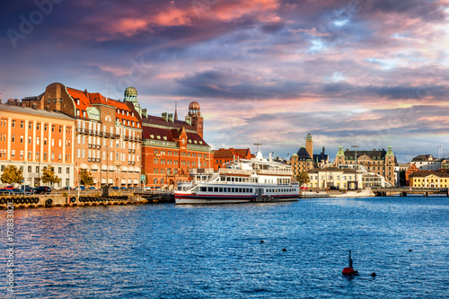 Fotografie Beautiful cityscape, Malmo Sweden, canal at sunset