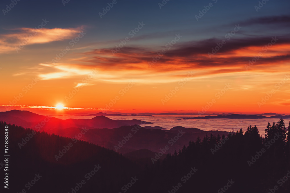 Aerial view of Sunrise over mountain and fog