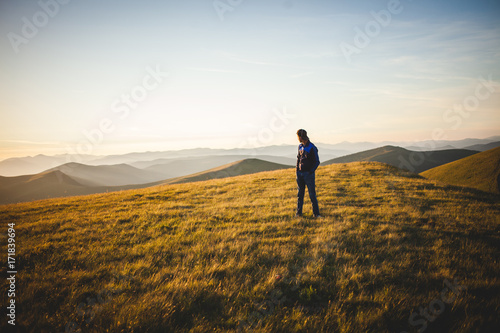 Young Boy Walk Through the Mountains