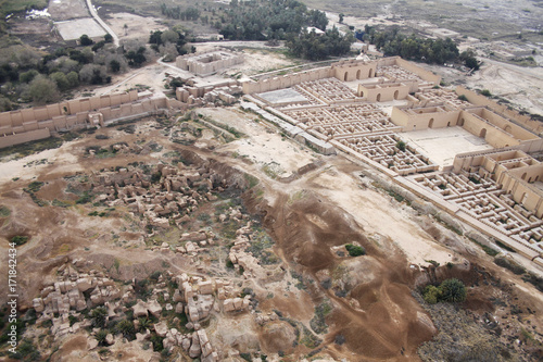 Fotografie Restored ruins of the South palace of Nebuchadnezzar in ancient Babylon, Iraq on the right