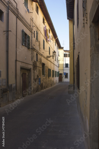 Fototapeta Naklejka Na Ścianę i Meble -  Narrow street in the small city of Lastra a Signa, Italy