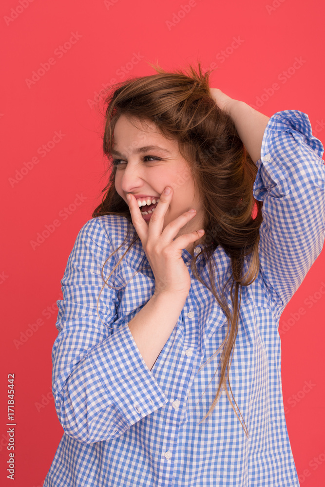 woman playing with her long silky hair woman playing with her long silky hair
