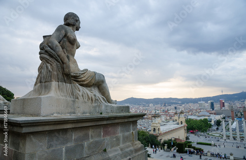 A stunning view of the fountains in barcelona Barcelona from the Museu nacional d Art de Catalunya, shot in a moody contrasty style. photo