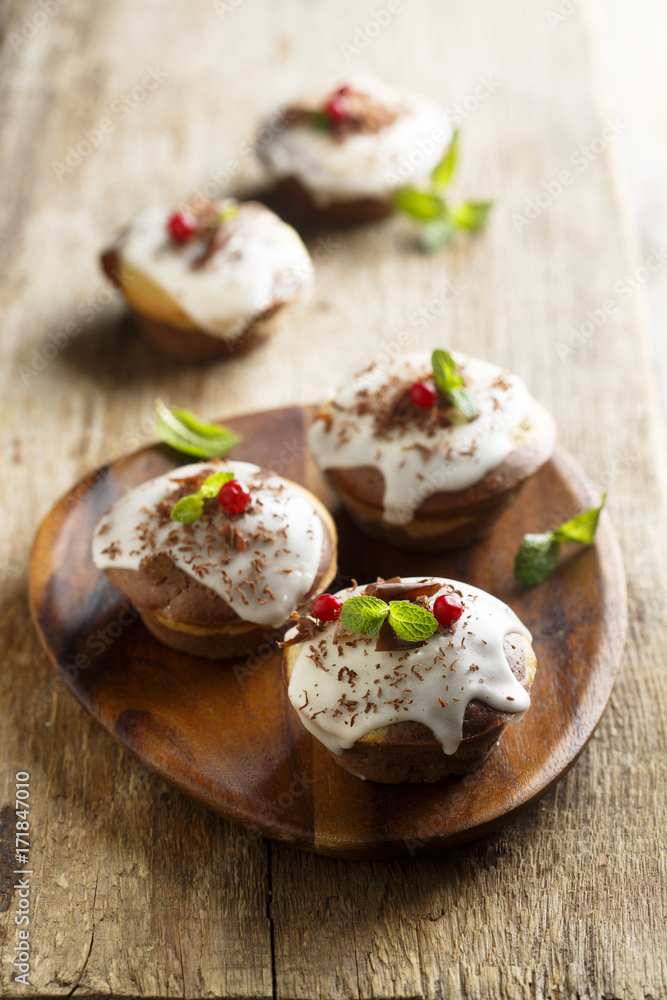 Homemade cocoa cakes with fresh berries Homemade cocoa cakes with fresh berries
