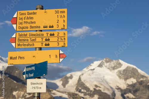 Typical yellow Signpost in the Swiss alps