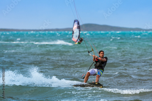 Windsurfer and kitesurfer