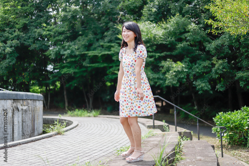 a portrait of beautiful woman in the park a portrait of beautiful woman in the park
