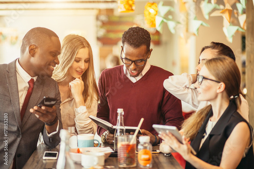 Business people Having Meeting In Outdoor Restaurant photo