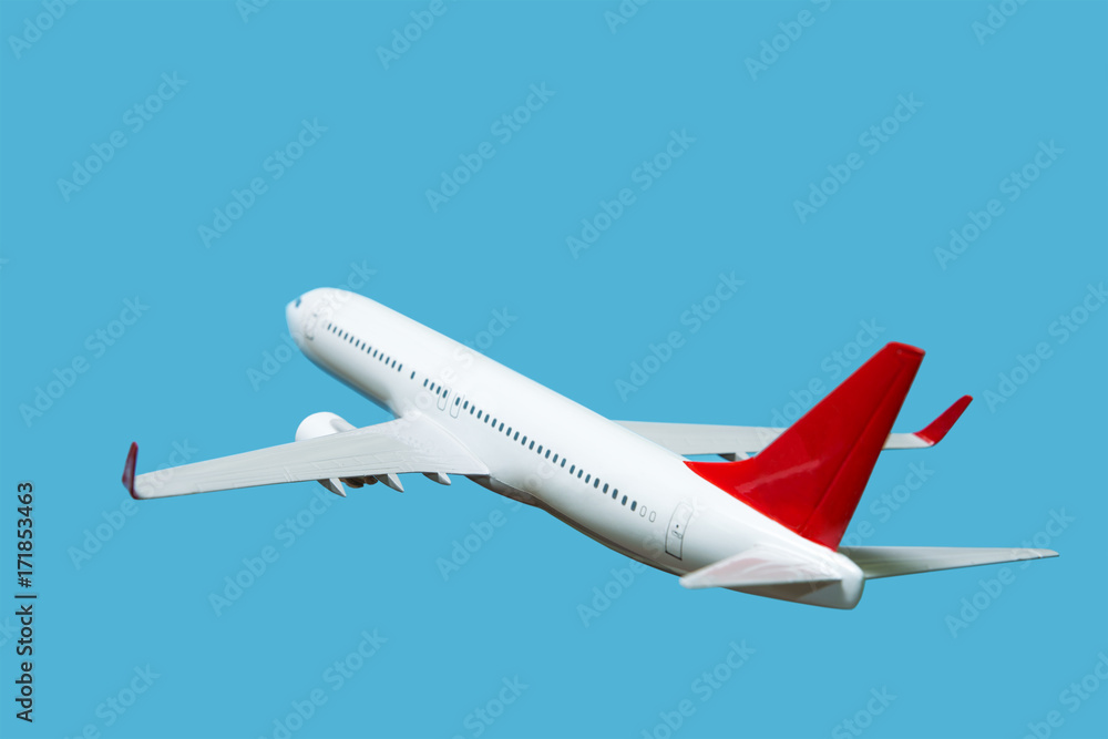 Obraz premium white airplane on a blue background, back view