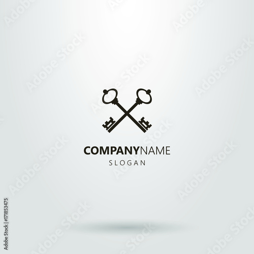 Black and white logo of two crossed keys