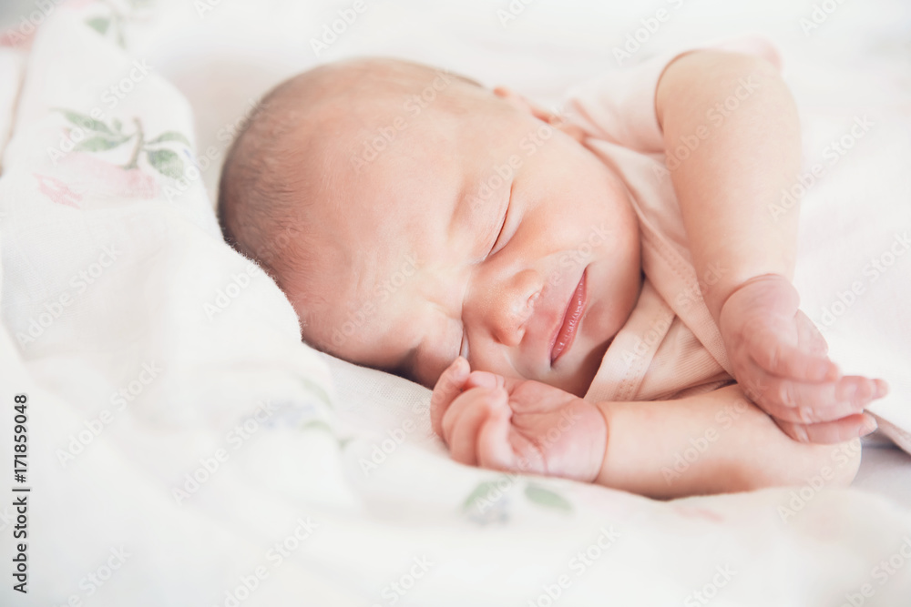 Newborn baby girl crying in a dream. Newborn baby girl crying in a dream.