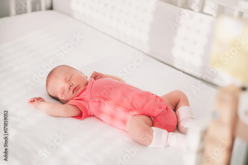 Photography Newborn baby sleep first days of life at home.