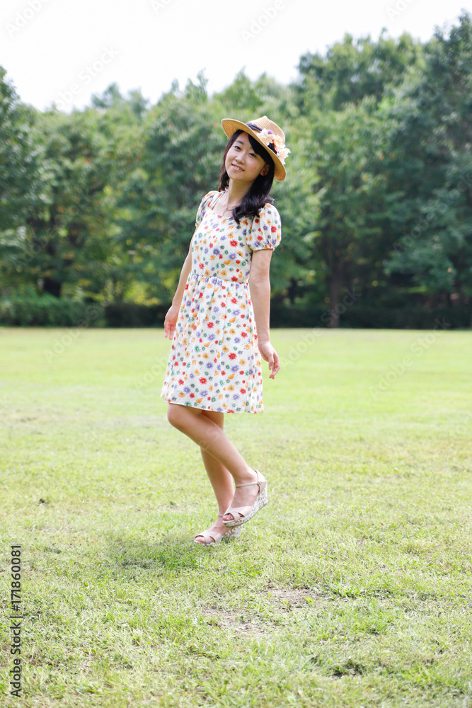 a portrait of beautiful woman in the park a portrait of beautiful woman in the park