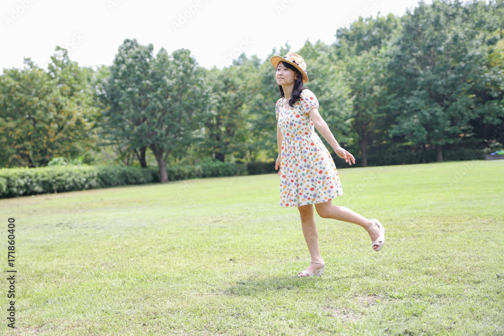 a portrait of beautiful woman in the park a portrait of beautiful woman in the park