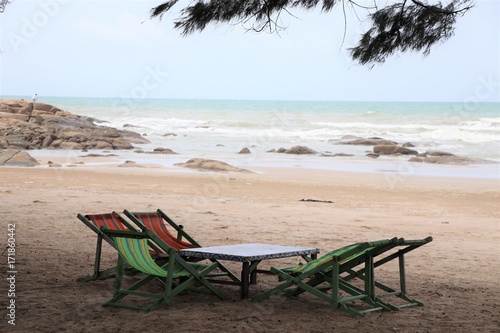 Bed beach and chairs without umbrella at Rayong beach Thailand