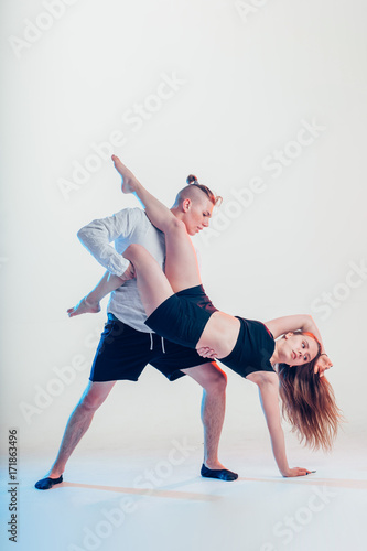 Man and woman in passionate dance pose photo