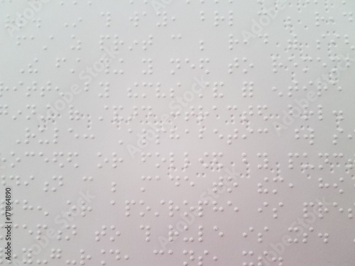 braille dots on a piece of paper photo