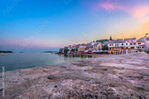 Primosten town sunset. / Sunset colorful view at coastal town Primosten in Croatia, marble tourist place on Adriatic Sea.