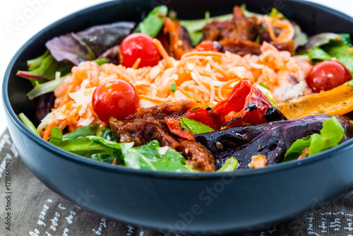 Delicious fresh salad and olive oil