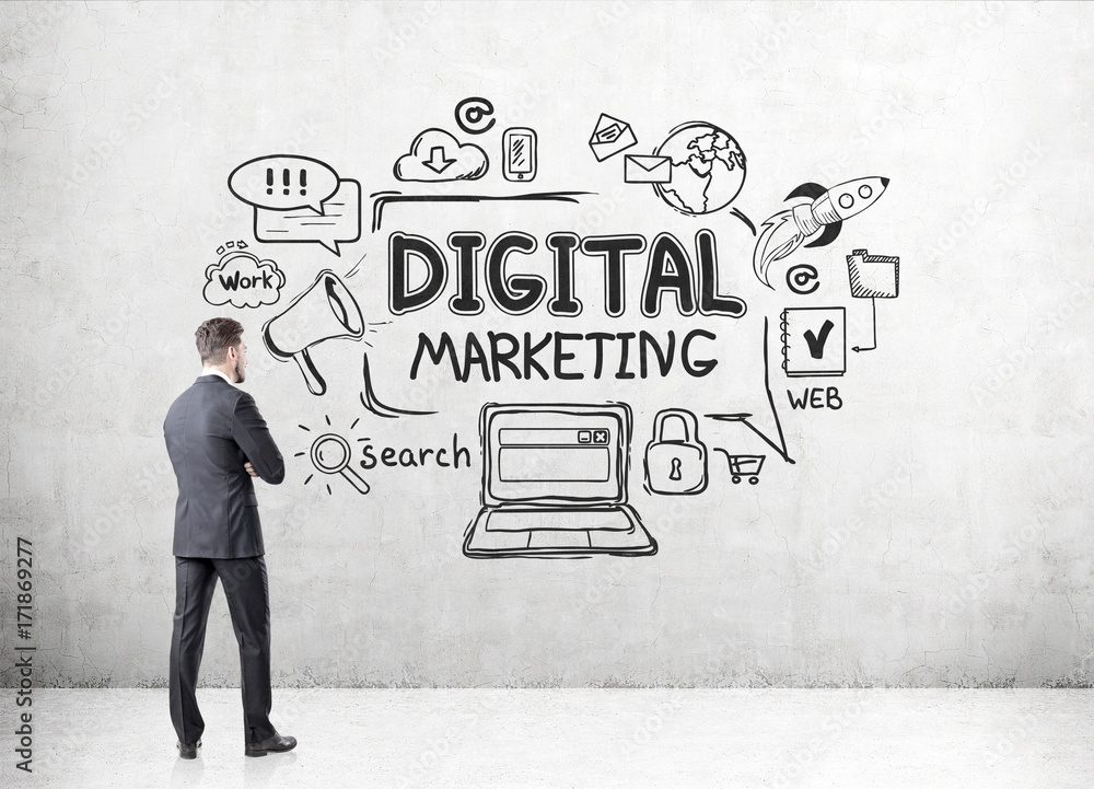 Businessman looking at digital marketing icons Businessman looking at digital marketing icons