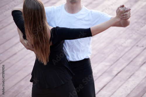 Fototapeta Couple dancing waltz or tango