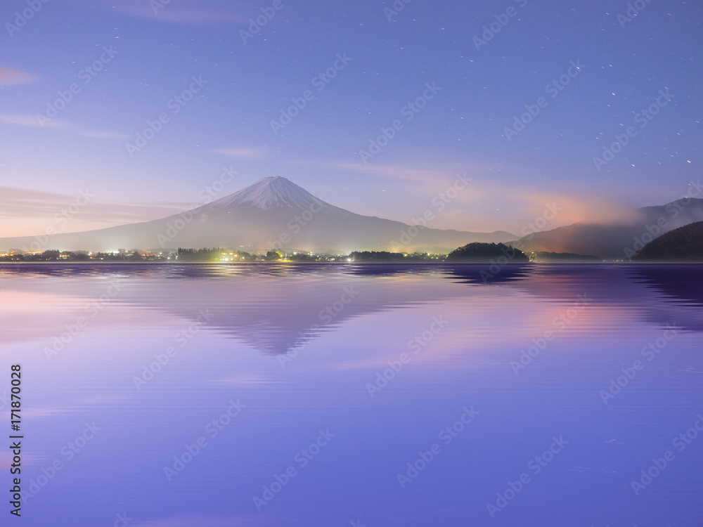 reflection on water from mountain fuji at kawaguchiko lake japan