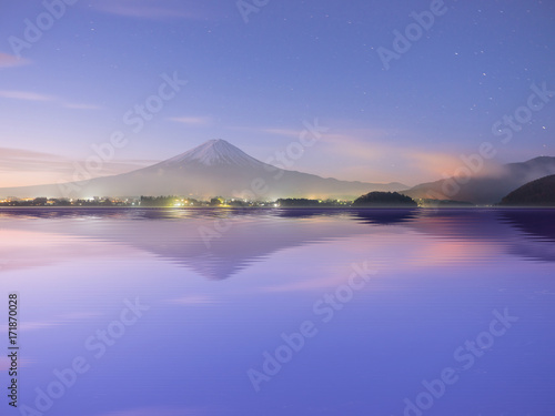 reflection on water from mountain fuji at kawaguchiko lake japan