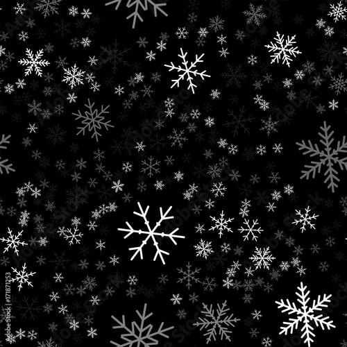 White snowflakes seamless pattern on black Christmas background. Chaotic scattered white snowflakes. Adorable Christmas creative pattern. Vector illustration.