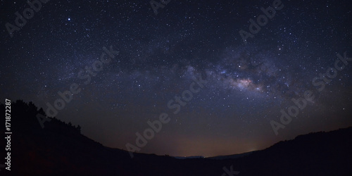 panorama milky way galaxy over moutain at Phu Hin Rong Kla National Park Phitsanulok Thailand