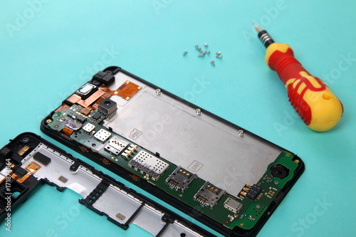 Close-up photos showing process of mobile phone repair © Rahul