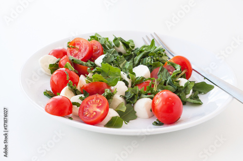 salad of tomato, mozzarella and rucola