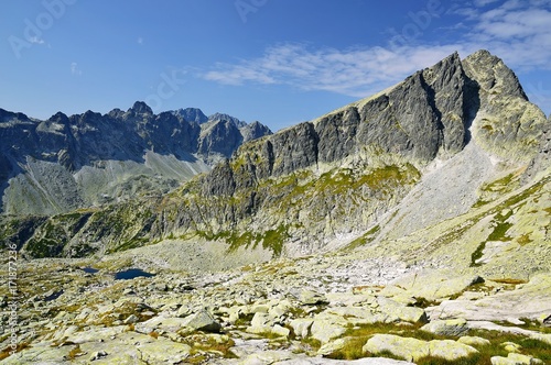 High Tatras in Slovakia. Monumental peaks. Summer scenic landscape mountain view. Alpine trail. Javorovy peak in Big cold valley.